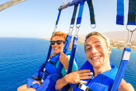 Ready for parasailing adventure in Hurghada with blue sky and sea background.