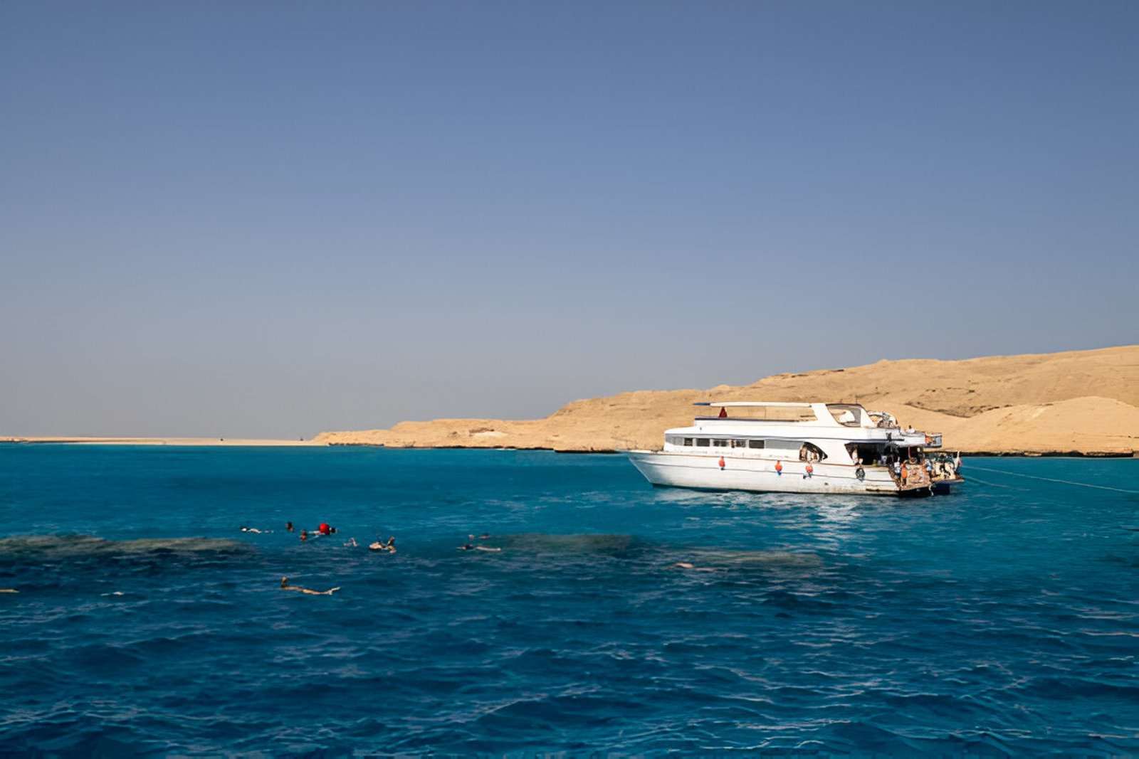 Snorkeling and sea trip in Hurghada with vibrant coral reefs and turquoise waters.